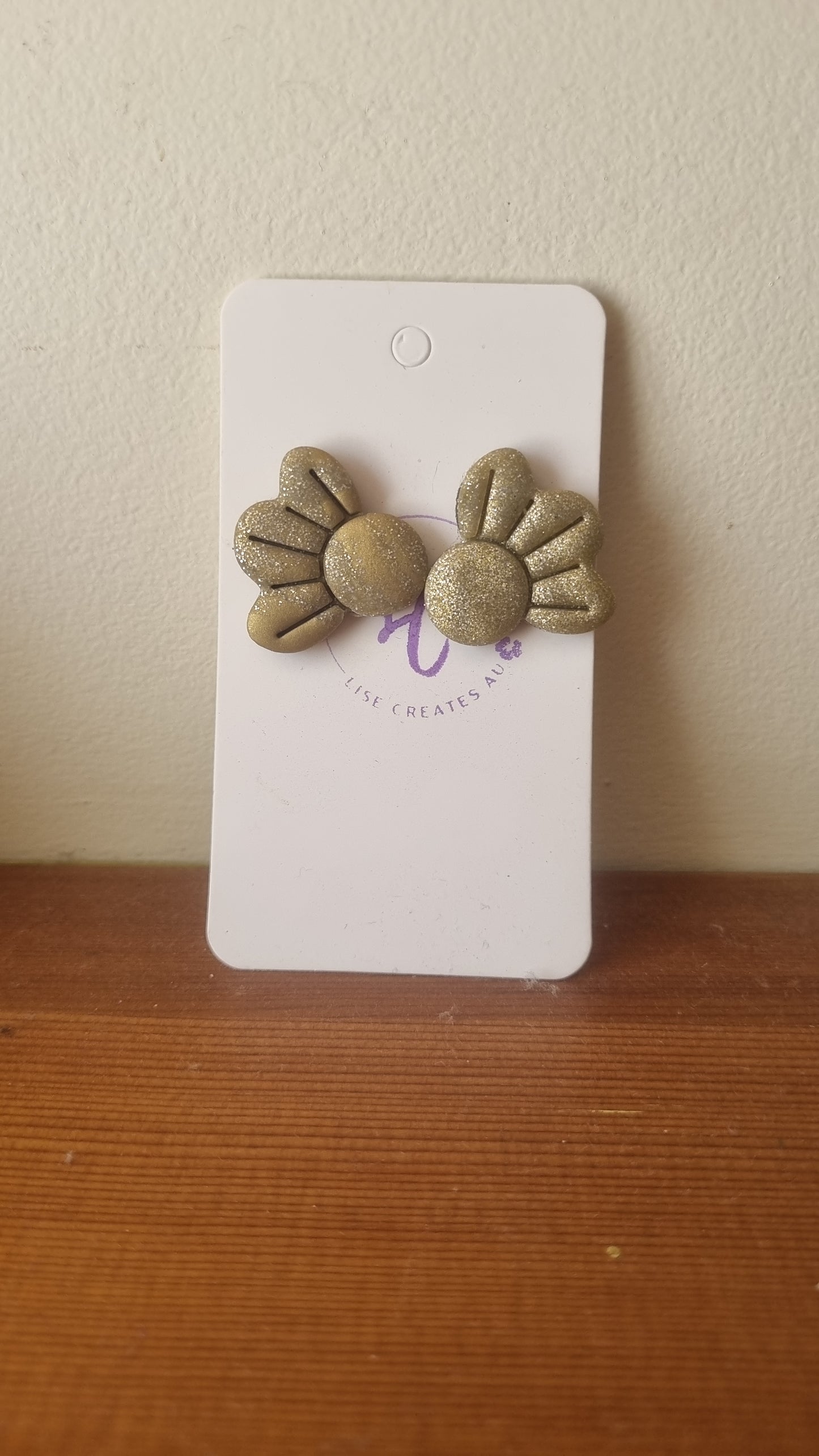 Half flower earrings